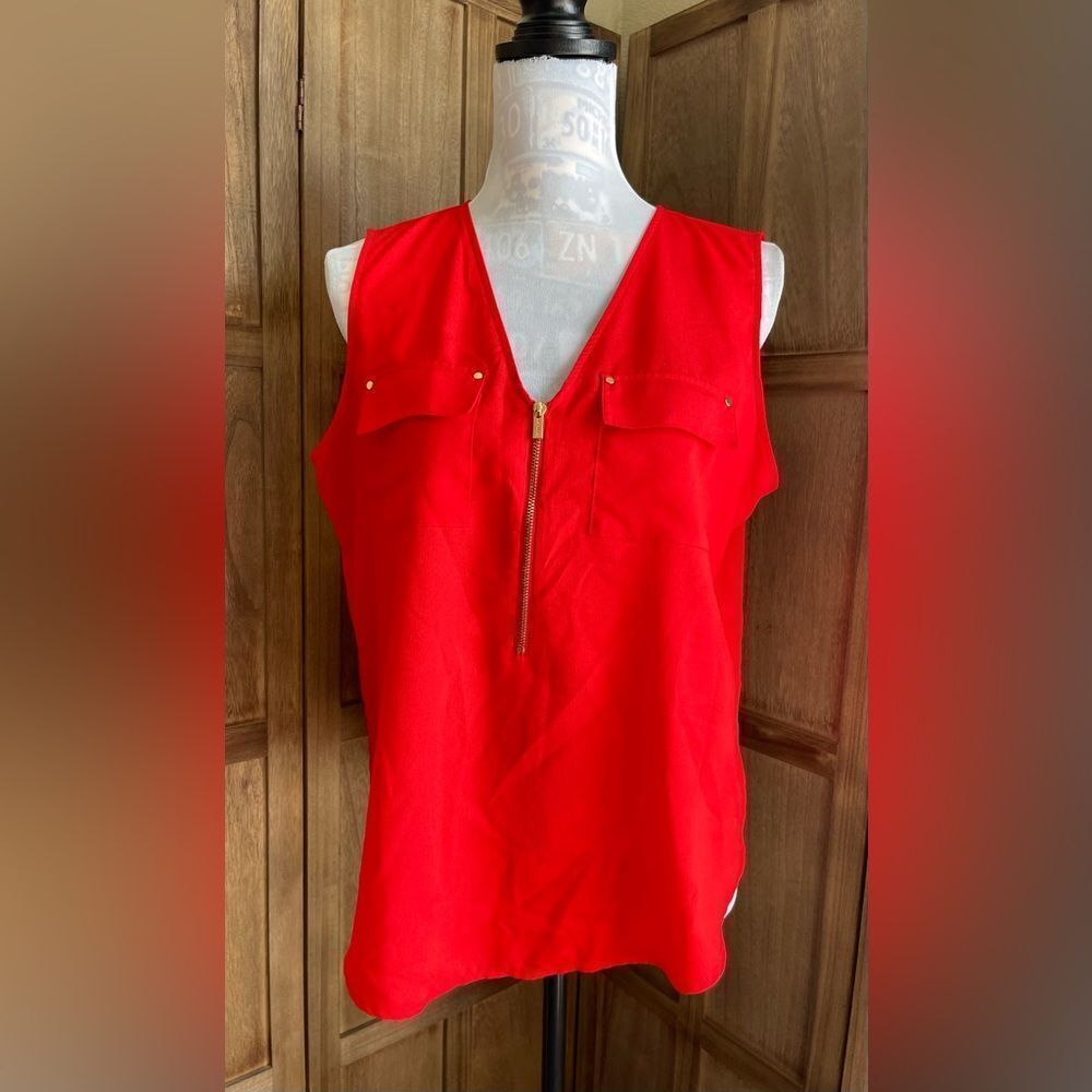 EUC. Women’s Red Calvin Klein sleeveless blouse with gold accents.